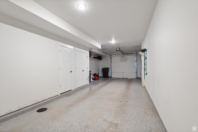 garage featuring a garage door opener
