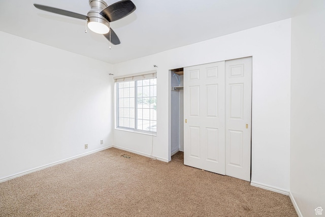 2356 E 3900 S, Millcreek, UT 84124 - unfurnished bedroom featuring light carpet, a closet, and a ceiling fan