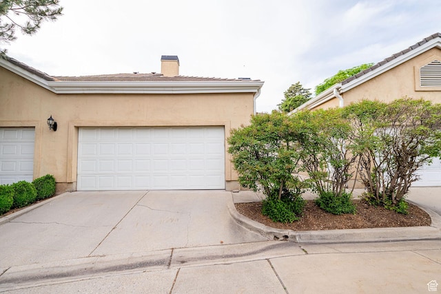2356 E 3900 S, Millcreek, UT 84124 - garage featuring concrete driveway