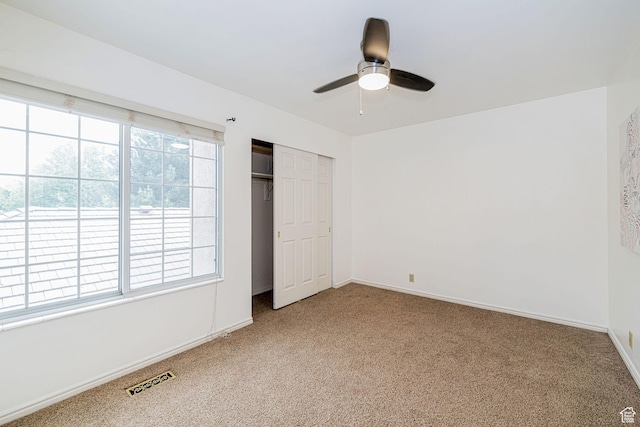 2356 E 3900 S, Millcreek, UT 84124 - unfurnished bedroom with carpet floors, multiple windows, and a closet