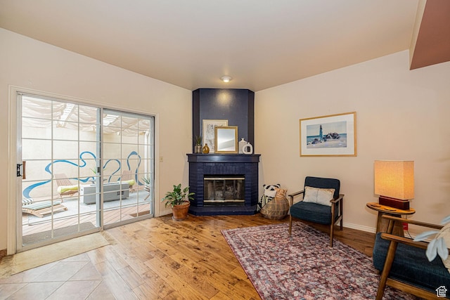 2356 E 3900 S, Millcreek, UT 84124 - sitting room with a fireplace and wood finished floors