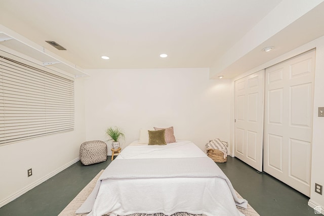 2356 E 3900 S, Millcreek, UT 84124 - bedroom featuring finished concrete floors, a closet, and recessed lighting
