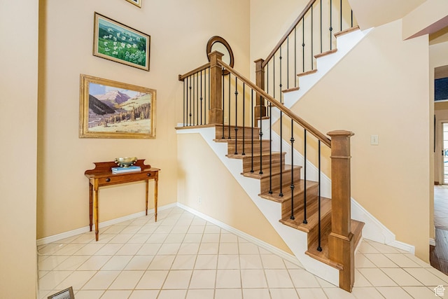 2356 E 3900 S, Millcreek, UT 84124 - stairs with tile patterned floors and a towering ceiling
