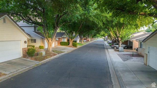 view of street featuring curbs and sidewalks