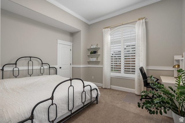 bedroom featuring crown molding, carpet flooring, and baseboards