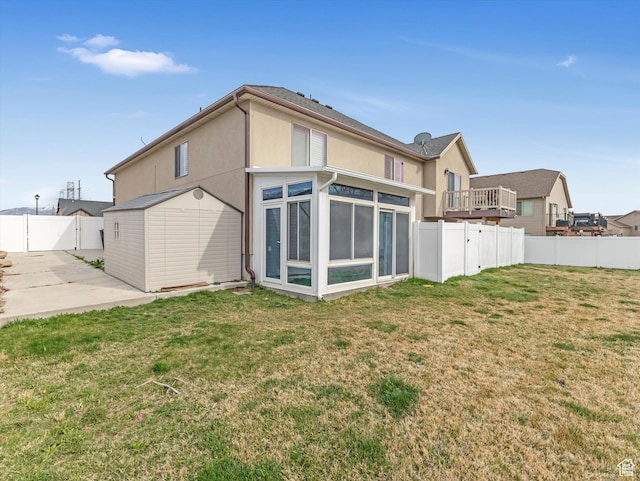 3057 N 3325 W, Plain City, UT 84404 - rear view of property with a sunroom, a yard, a fenced backyard, and a patio area