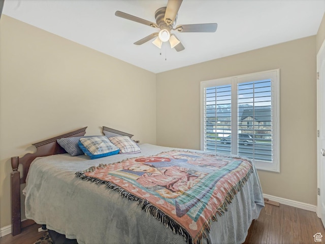 3057 N 3325 W, Plain City, UT 84404 - bedroom with wood finished floors, ceiling fan, and baseboards