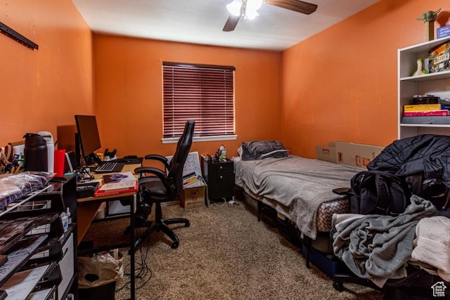 carpeted bedroom with a ceiling fan