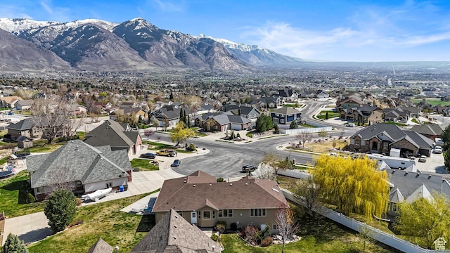 drone / aerial view with a residential view and a mountain view