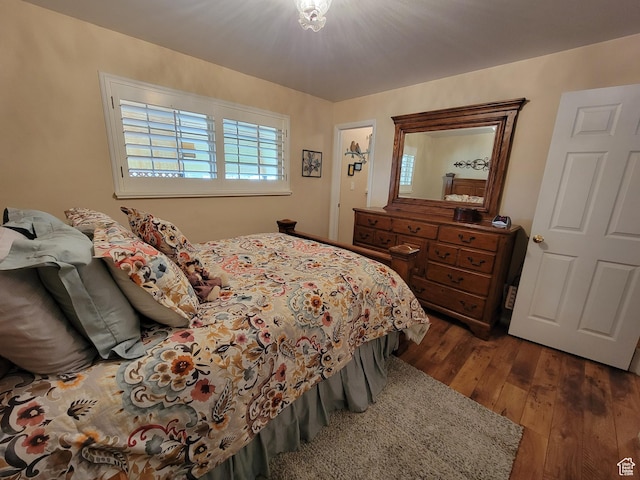 bedroom with wood-type flooring