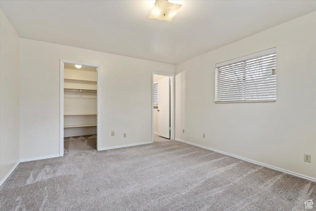 148 N 100 E, American Fork, UT 84003 - unfurnished bedroom with carpet floors, a spacious closet, a closet, and baseboards