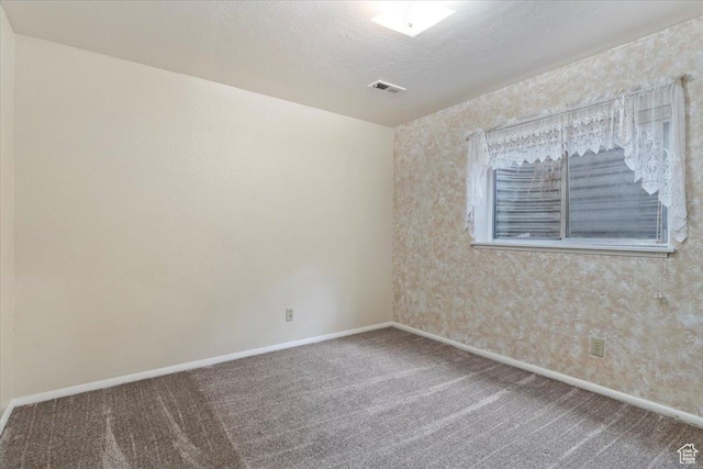 148 N 100 E, American Fork, UT 84003 - carpeted spare room featuring a textured ceiling, baseboards, and visible vents