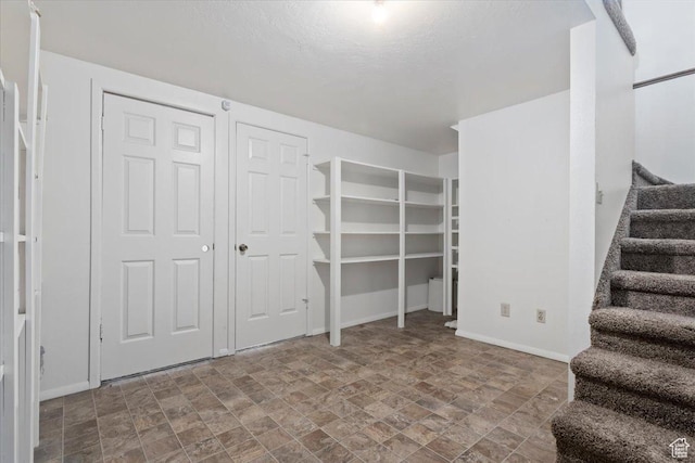 148 N 100 E, American Fork, UT 84003 - basement featuring stairs, stone finish floor, and baseboards
