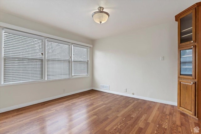 148 N 100 E, American Fork, UT 84003 - empty room with visible vents, baseboards, and wood finished floors