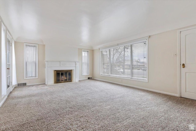 148 N 100 E, American Fork, UT 84003 - unfurnished living room with plenty of natural light, carpet, visible vents, and baseboards