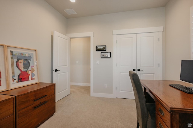 office area with light carpet, visible vents, and baseboards