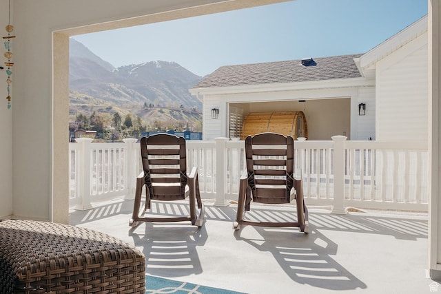 view of patio / terrace featuring a mountain view