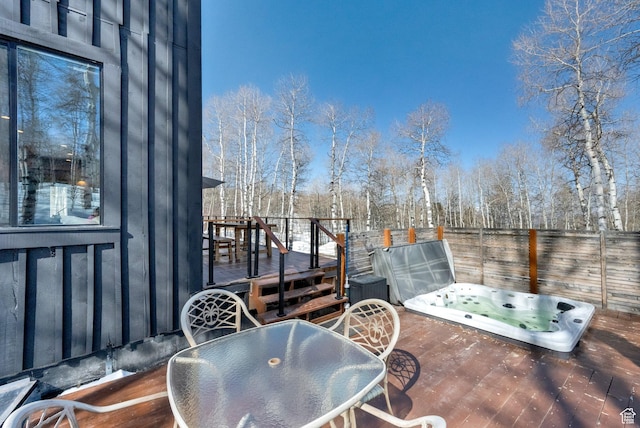 10802 E Green Briar Rd Unit 562, Heber City, UT 84032 - wooden terrace featuring outdoor dining space, fence, and an outdoor hot tub