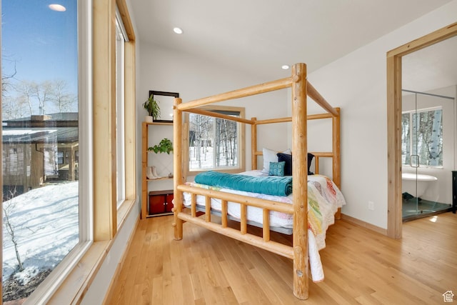 10802 E Green Briar Rd Unit 562, Heber City, UT 84032 - bedroom featuring recessed lighting, multiple windows, and wood finished floors