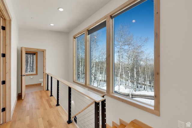 10802 E Green Briar Rd Unit 562, Heber City, UT 84032 - hall featuring wood finished floors, baseboards, an upstairs landing, and recessed lighting