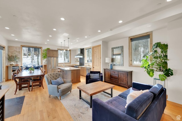 10802 E Green Briar Rd Unit 562, Heber City, UT 84032 - living room featuring recessed lighting and light wood-type flooring