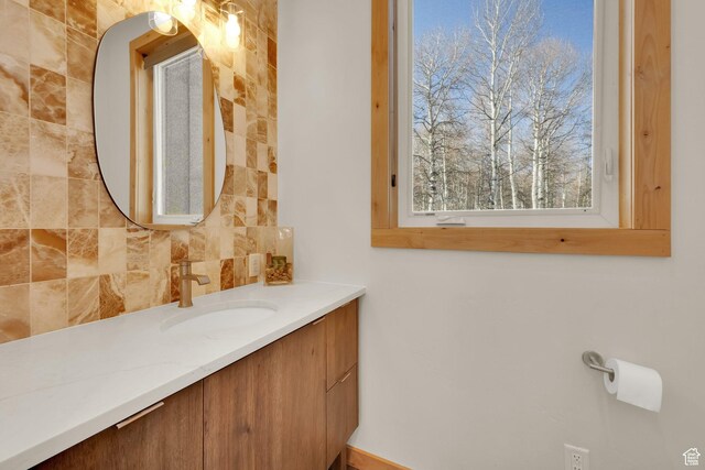 10802 E Green Briar Rd Unit 562, Heber City, UT 84032 - bathroom featuring decorative backsplash and vanity