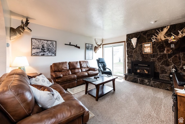 314 W 100 S, Providence, UT 84332 - living room with a textured ceiling, a stone fireplace, and carpet floors
