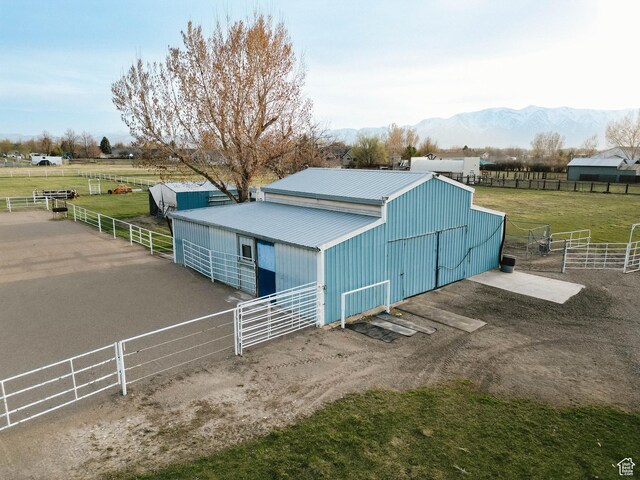 314 W 100 S, Providence, UT 84332 - exterior space featuring a rural view, an outbuilding, a mountain view, and an exterior structure