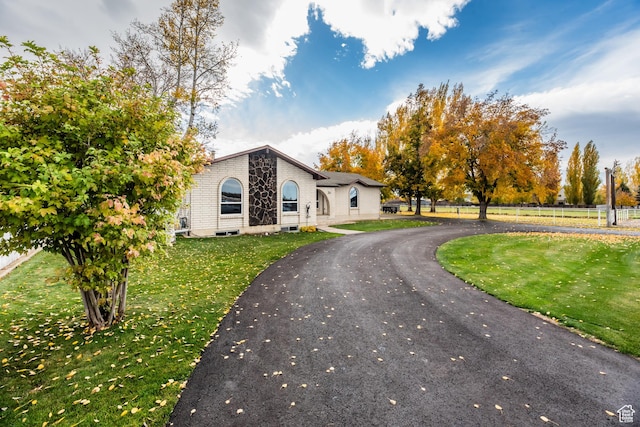 314 W 100 S, Providence, UT 84332 - view of front of property with curved driveway and a front lawn