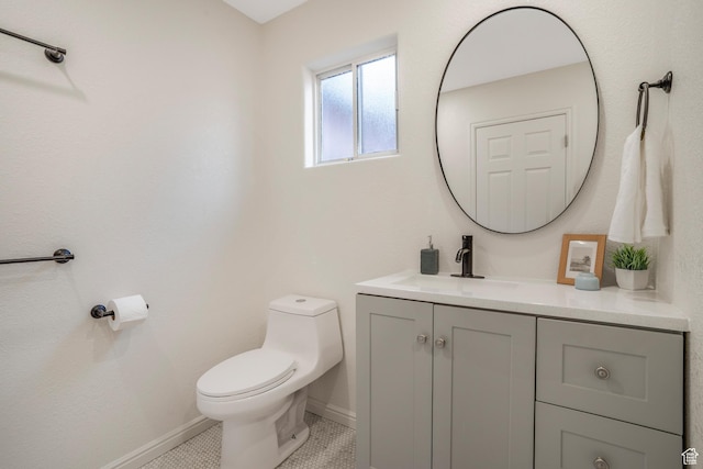 282 Valley View Dr, Springdale, UT 84767 - half bath with tile patterned floors, vanity, baseboards, and toilet