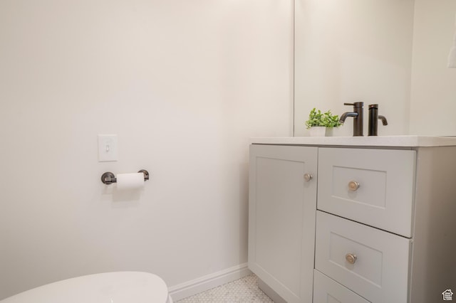 282 Valley View Dr, Springdale, UT 84767 - bathroom featuring toilet, baseboards, and vanity