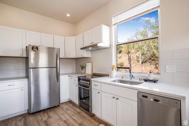 282 Valley View Dr, Springdale, UT 84767 - kitchen with light countertops, tasteful backsplash, appliances with stainless steel finishes, and a sink