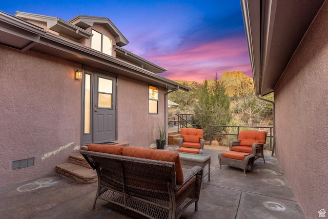 282 Valley View Dr, Springdale, UT 84767 - patio terrace at dusk featuring an outdoor living space