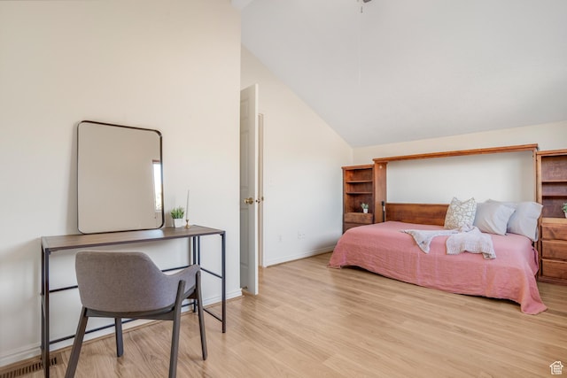 282 Valley View Dr, Springdale, UT 84767 - bedroom with light wood-style flooring, baseboards, and lofted ceiling