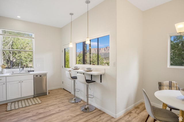 282 Valley View Dr, Springdale, UT 84767 - dining room with light wood-style flooring and baseboards