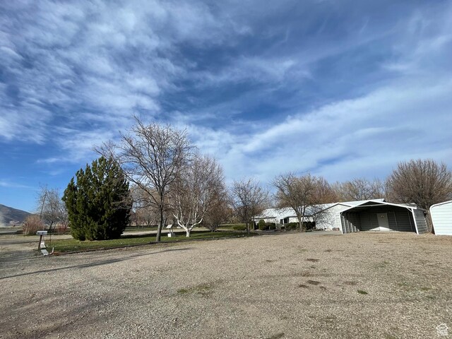 848 N 500 W, Malad City, ID 83252 - view of yard with a carport and driveway