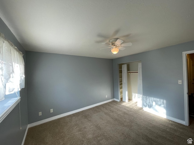 848 N 500 W, Malad City, ID 83252 - unfurnished bedroom featuring a closet, ceiling fan, baseboards, and carpet floors
