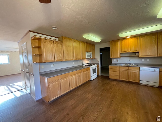 848 N 500 W, Malad City, ID 83252 - kitchen featuring white appliances, dark wood-style floors, a textured ceiling, open shelves, and a sink