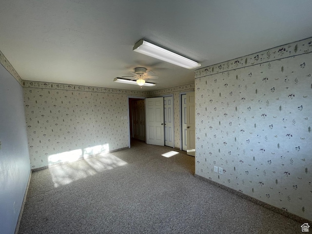 848 N 500 W, Malad City, ID 83252 - carpeted spare room featuring baseboards, ceiling fan, and wallpapered walls