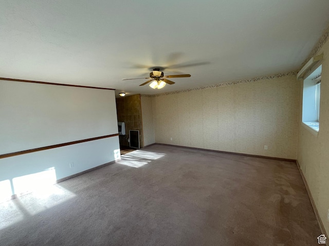 848 N 500 W, Malad City, ID 83252 - carpeted spare room with ceiling fan, baseboards, and a large fireplace
