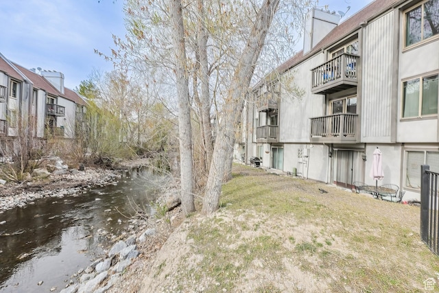 view of yard with a water view
