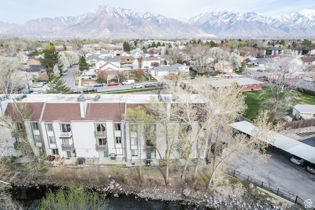 drone / aerial view with a mountain view and a residential view
