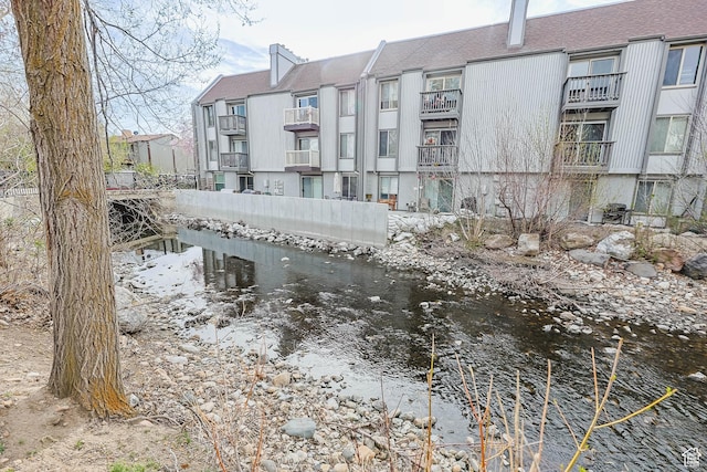 surrounding community featuring a water view
