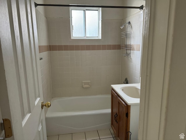 full bathroom with tile patterned floors, vanity, and tub / shower combination