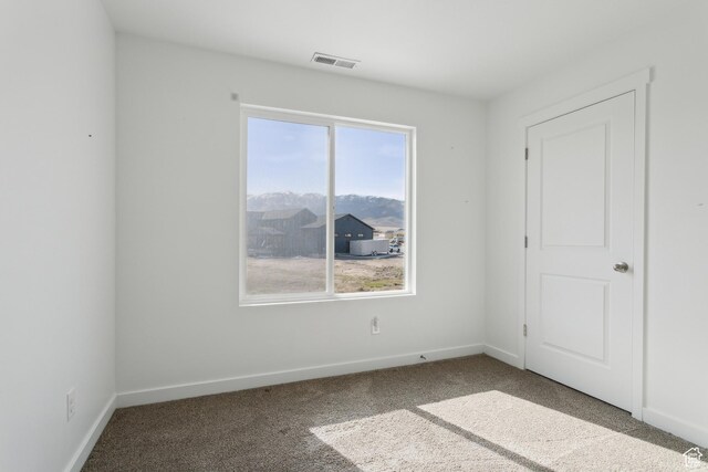 13 N N Maraschino Ln, Grantsville, UT 84029 - unfurnished room with visible vents, baseboards, and carpet flooring