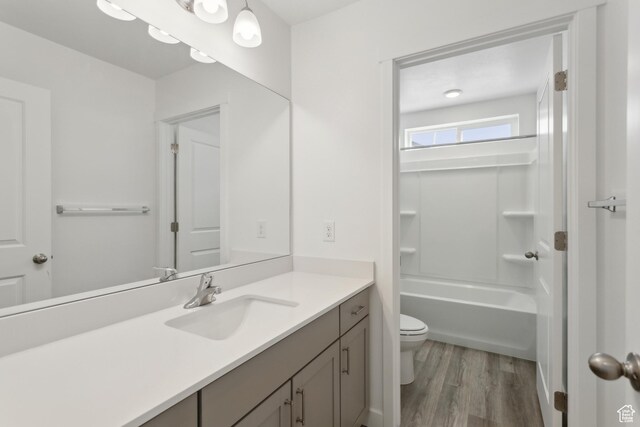 13 N N Maraschino Ln, Grantsville, UT 84029 - full bathroom with toilet, wood finished floors, and vanity