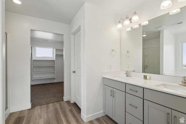 13 N N Maraschino Ln, Grantsville, UT 84029 - full bath featuring a shower stall, wood finished floors, a sink, and visible vents