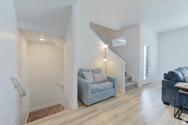 4696 W Talavera Way, Kearns, UT 84118 - living area featuring baseboards, stairway, and wood finished floors