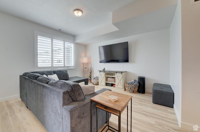 4696 W Talavera Way, Kearns, UT 84118 - living area featuring visible vents, light wood-type flooring, and baseboards