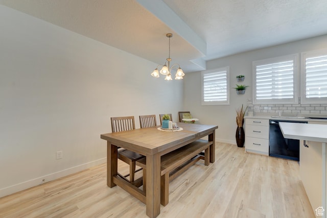 4696 W Talavera Way, Kearns, UT 84118 - dining area with light wood-style flooring, a notable chandelier, and baseboards
